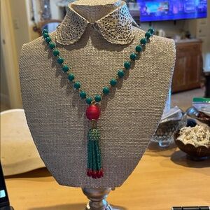 Handcrafted Green Beaded Necklace with Red Tassel